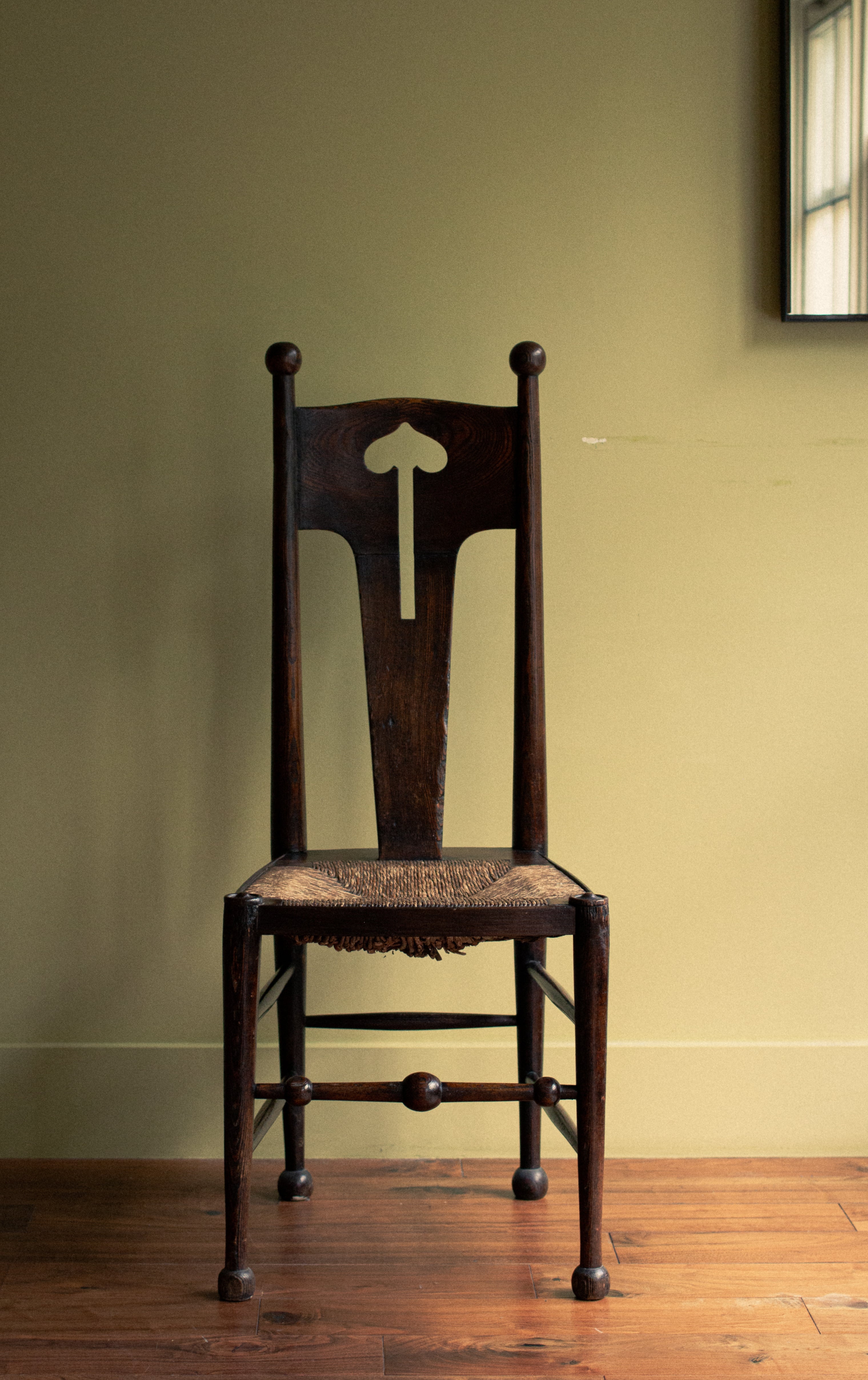 Sculpted arts and craft chair, original straw, 1903