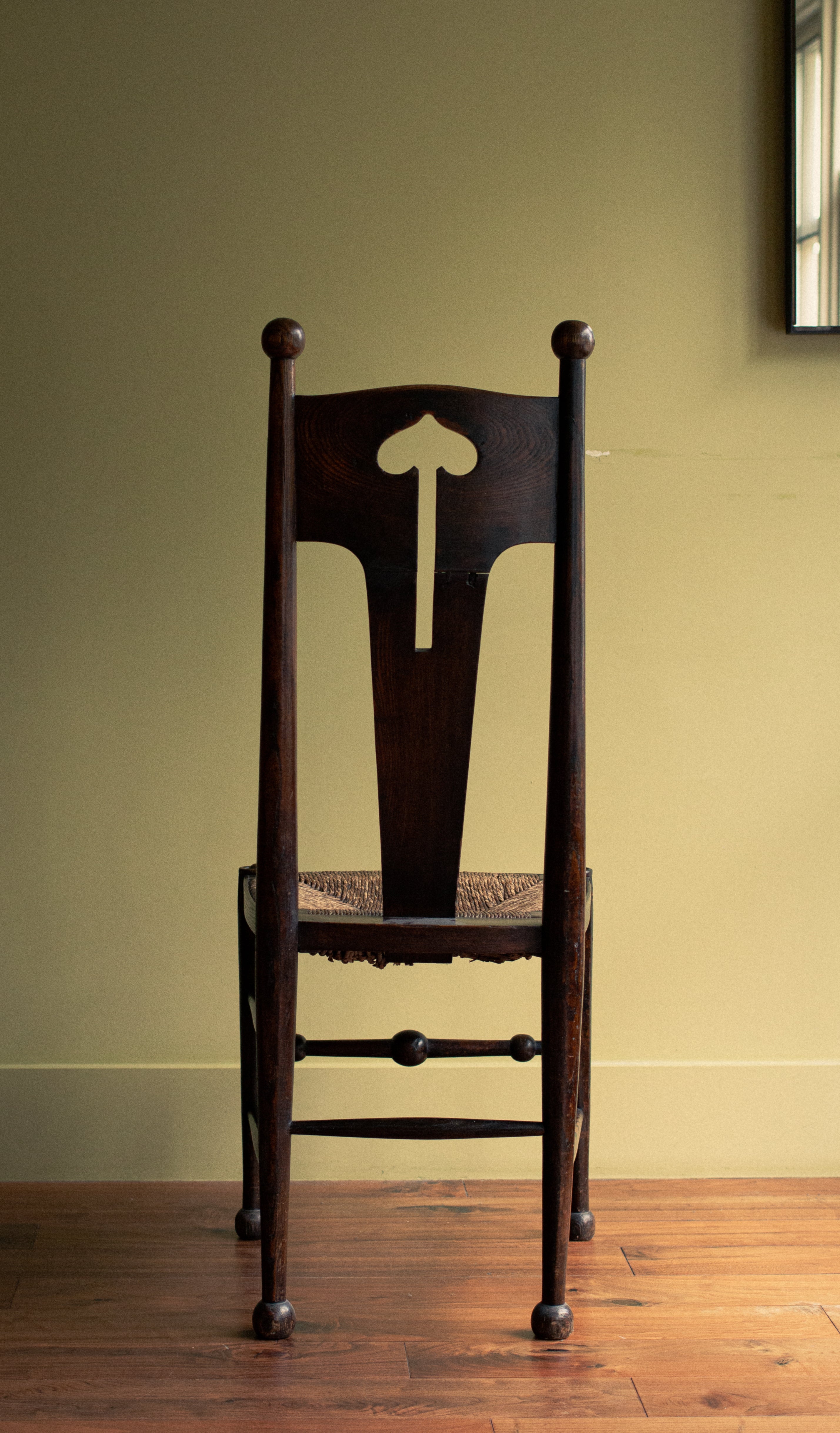 Sculpted arts and craft chair, original straw, 1903