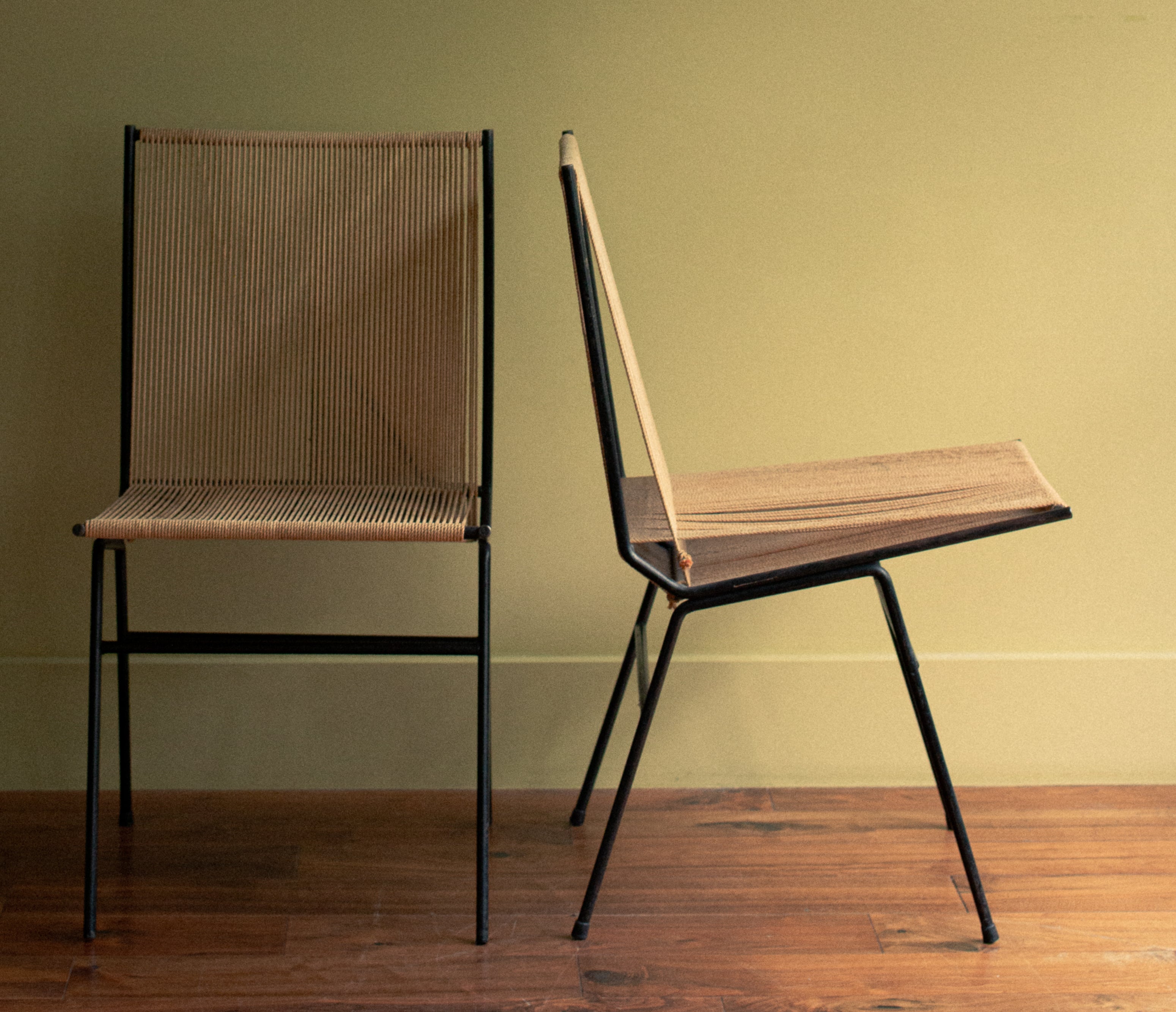Rare pair of chairs in iron with original cords, anonymous, early 1950