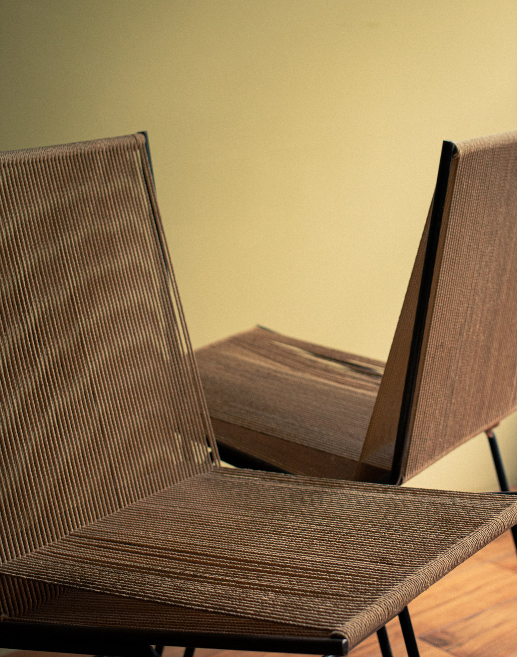Rare pair of chairs in iron with original cords, anonymous, early 1950