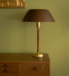 Lisa Johansson Pape lamp in brass with original leather, circa 1950