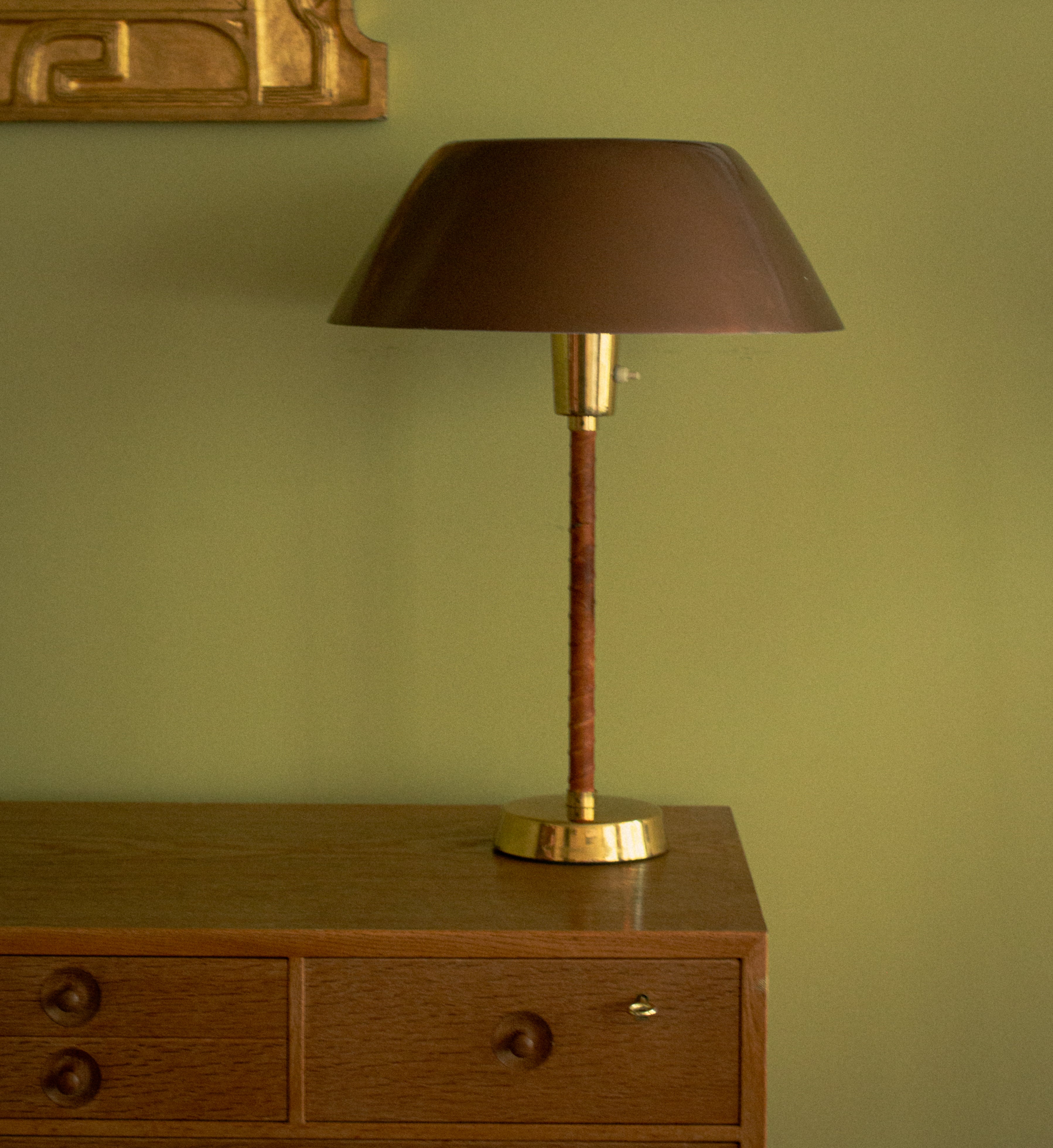 Lisa Johansson Pape lamp in brass with original leather, circa 1950