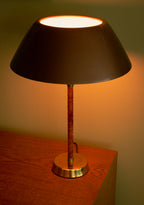 Lisa Johansson Pape lamp in brass with original leather, circa 1950